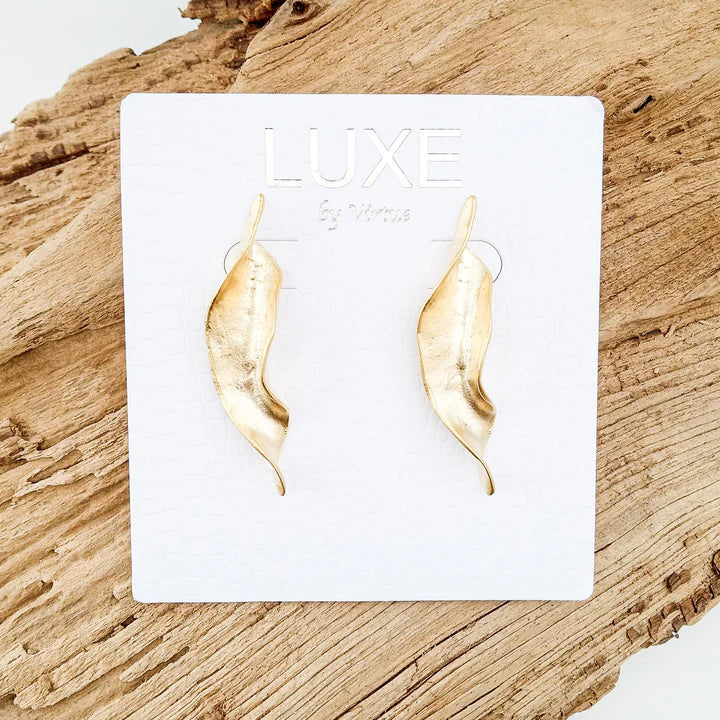 The Cleopatra LUXE Wavy Long Earrings by Virtue Jewelry in Gold