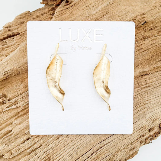 The Cleopatra LUXE Wavy Long Earrings by Virtue Jewelry in Gold