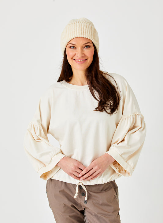 Bo Bubble Sleeve Sweat with Drawstring Hem by Suzy D London in Winter White