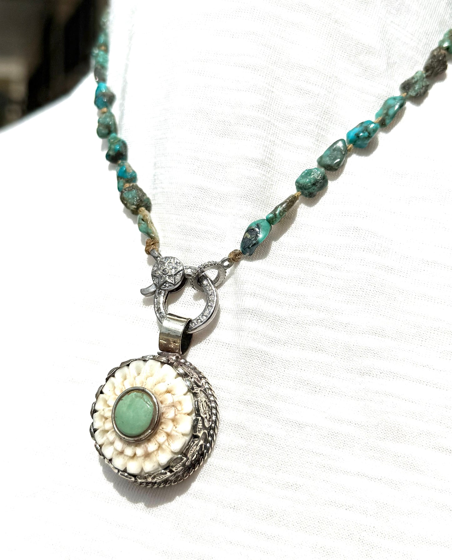 Bone Flower Pendant On Turquoise Strand and Pave Diamond Clasp by Paula Carvalho Designs