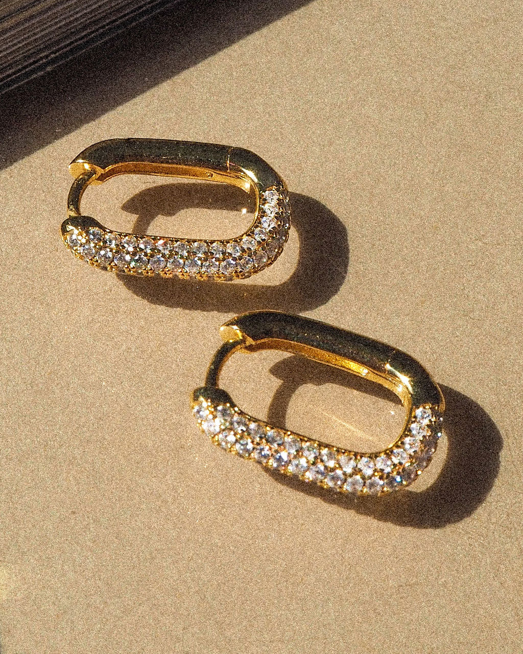 Pave Chain Link Huggies by LUV AJ in Gold