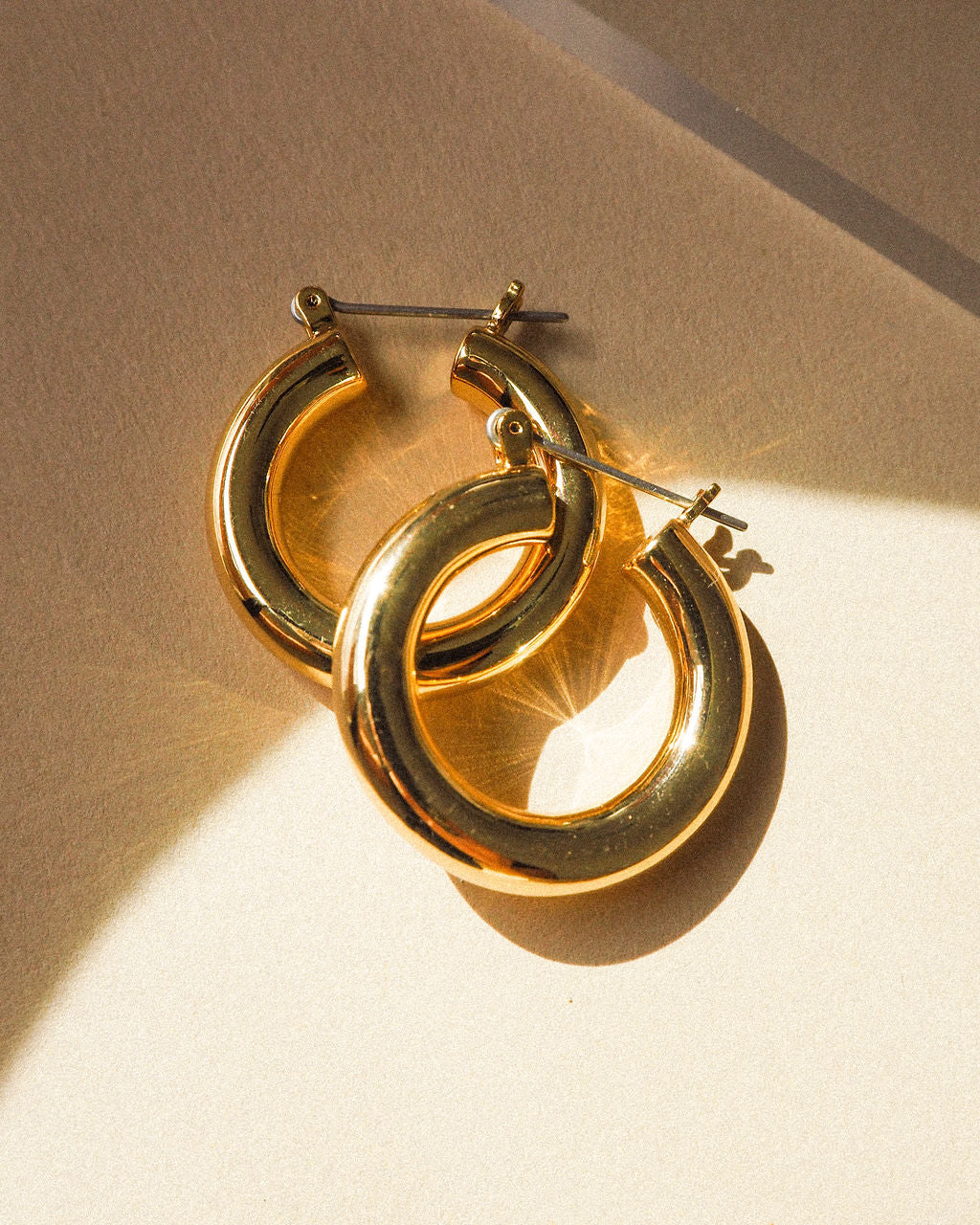 Baby Amalfi Tube Hoops by LUV AJ in Gold