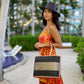 Small Wynwood Straw Tote Handbag w/Metallic Detailing by Shebobo in Black