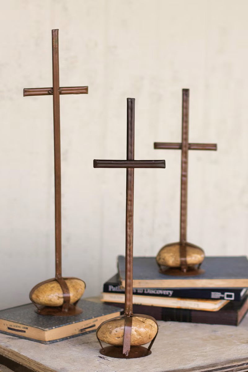Set of three scrap metal crosses with caged rock bases by Kalalou