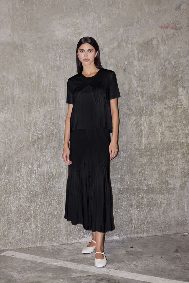 Miuna Wave Plisse Top by Wild Cosmos in Black