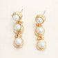 The Lynda Luxe Triple Drop Pearl Earrings by Virtue Jewelry