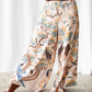 Hummingbird Palazzo Pants by One Hundred Stars in Nude