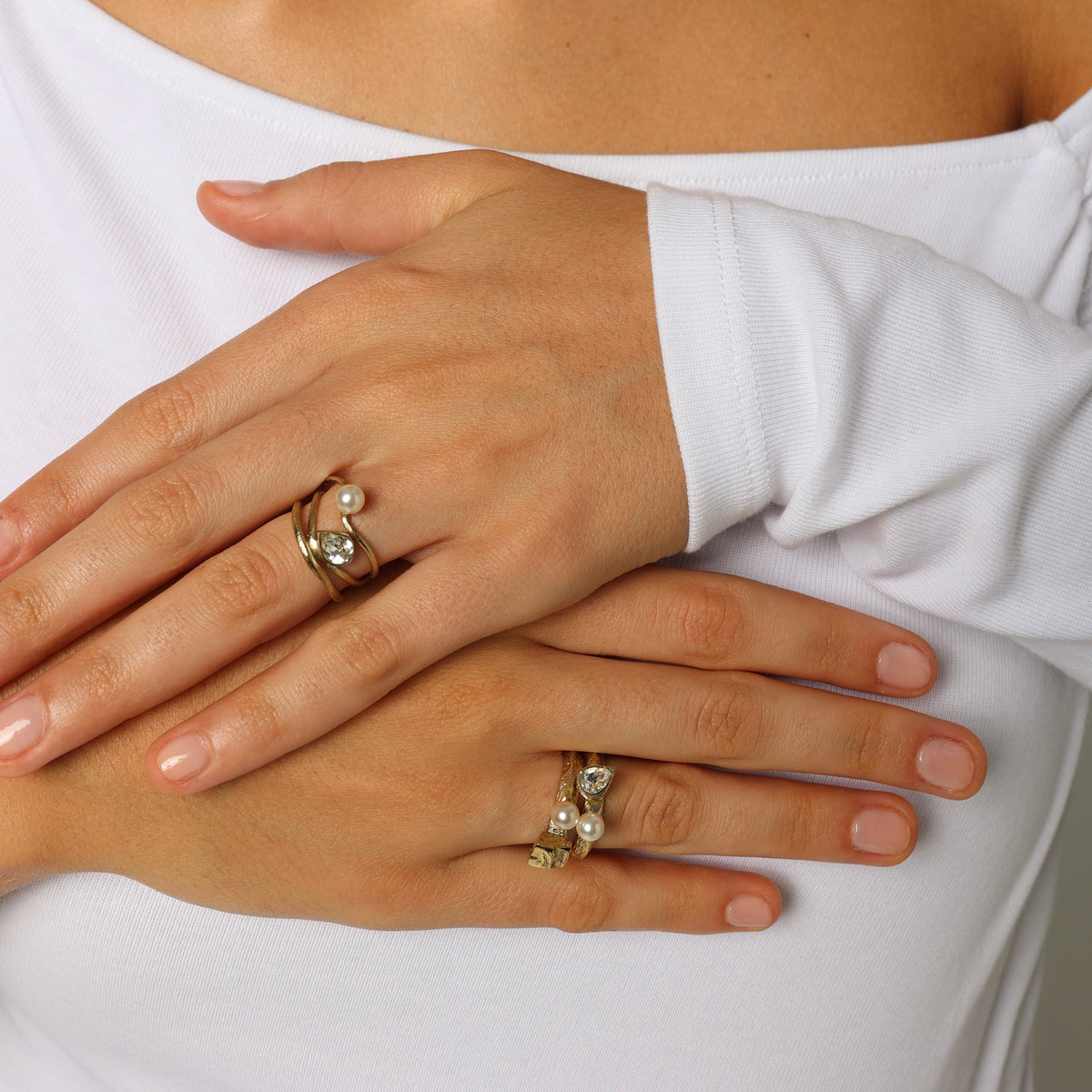 Gleam Swirly Ring by Kalliope Jewelry in Creamrose Light Pearl/White Crystal