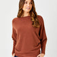 Lincoln Slash Neck Batwing Knit Sweater by Suzy D London in Pumpkin