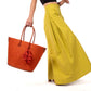 Santa Ynez Woven Small Straw Tote Bag w/Tassel Charm by Shebobo in Coral