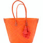 Santa Ynez Woven Small Straw Tote Bag w/Tassel Charm by Shebobo in Coral