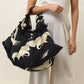 Stork Black Slouch Bag by One Hundred Stars