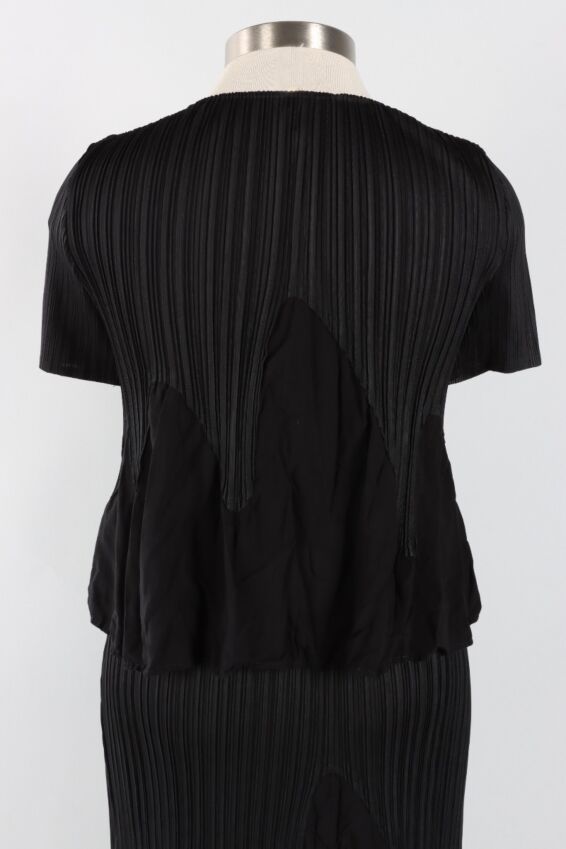 Miuna Wave Plisse Top by Wild Cosmos in Black